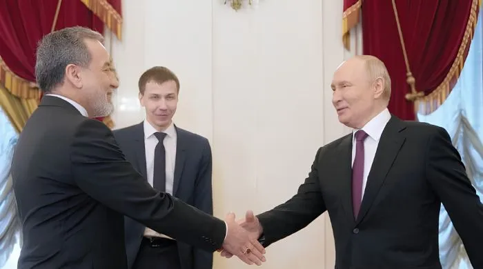 Vladimir Putin meets Iranian Foreign Minister Abbas Araghchi during talks praising Iran’s resistance