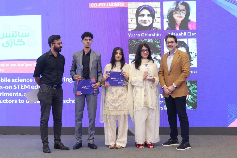 Students receiving certificates and recognition at the SparkTank Cohort 3 graduation ceremony in Lahore, showcasing young entrepreneurs alongside mentors and Beaconhouse leadership during the startup showcase event.